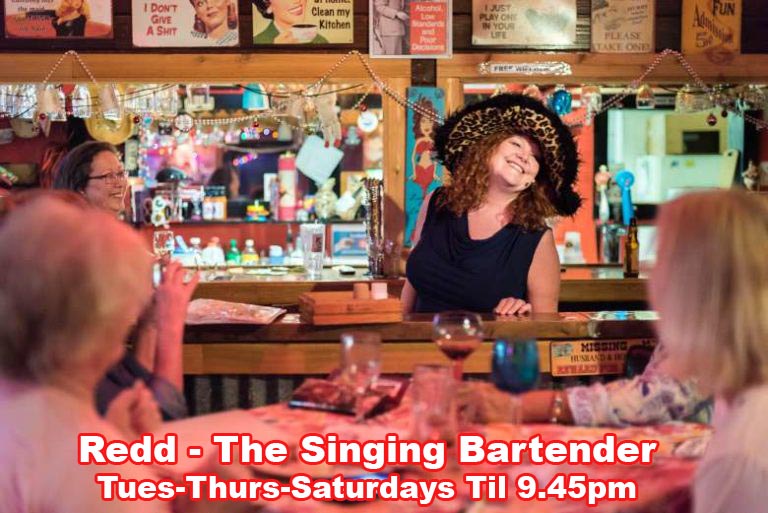 Redd is the Singing Bartender - Serving drinks and food while you pick which songs you want to hear